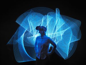 young woman with VR glasses