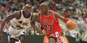 Chicago Bulls guard Michael Jordan drives past Orl