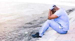 Distraught nurse takes break during COVID shift